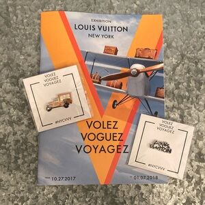 Louis Vuitton "Volez, Voguez, Voyagez" Collectable Pins and Exhibition Booklet